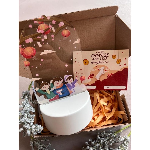 

Hampers / Giftset Lampu Akrilik Imlek CNY 2023
