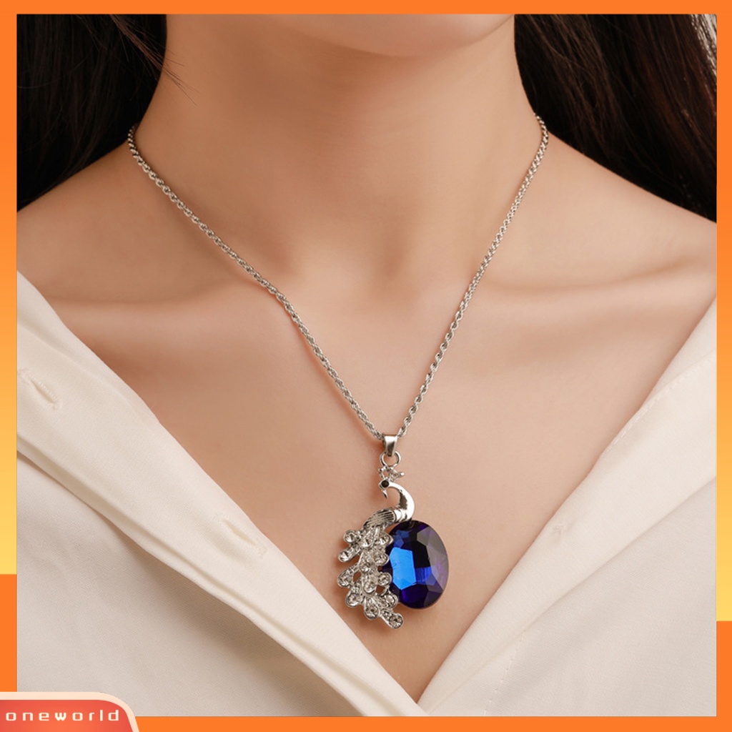 [ONE] 2pcs/set Kalung Anting Set Biru Kristal Imitasi Kepribadian Glitter Indah Bentuk Merak Hias Berlian Imitasi Liontin Anting Kalung Perhiasan Aksesori