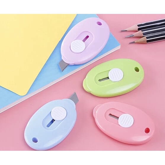 ACCFASHIONMURAH Cutter Lucu Warna Pastel / Cutter Mini Portable Bentuk Oval Mini Cutter Polos Travel Kit Pemotong Kertas Paper