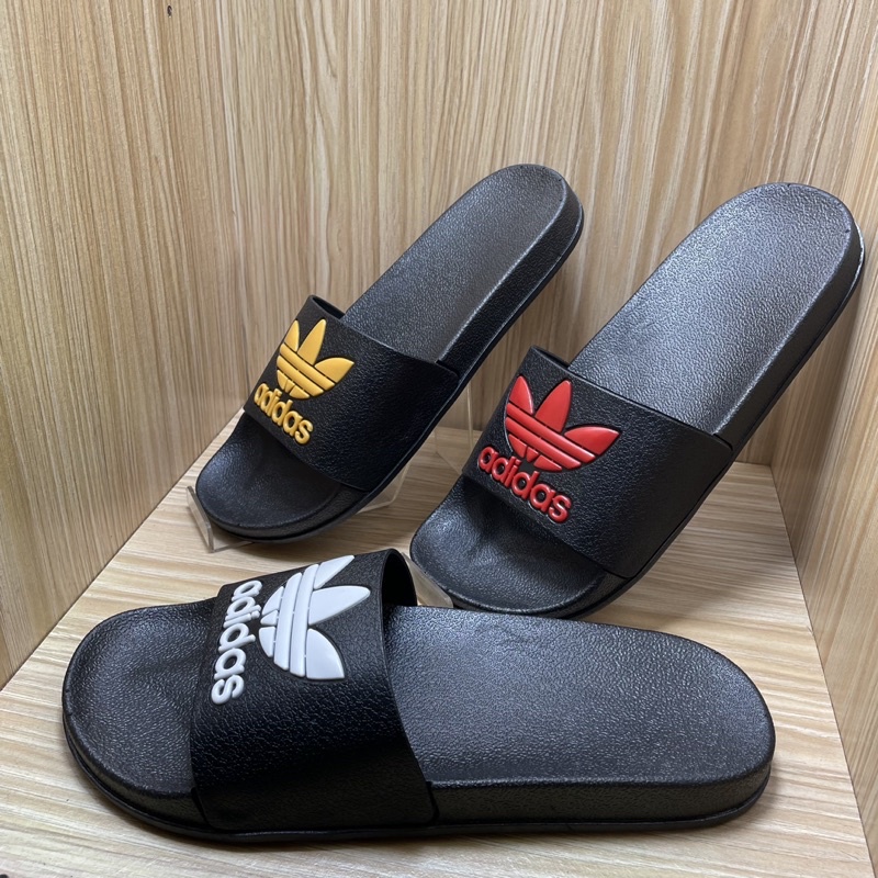 sendal slip on karet pria ADIDAS TL.