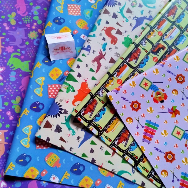 

Kertas Kado Lucu Murah Bahan Glossy dan Doff