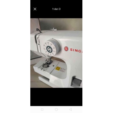 mesin jahit portable. bisa lubang kancing