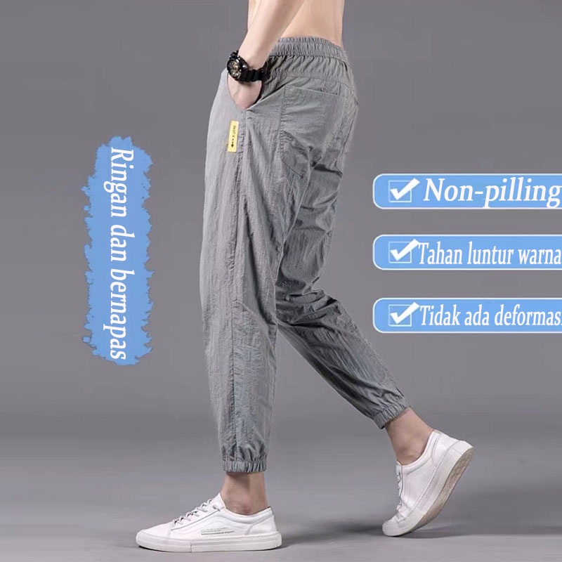 Celana Kasual Pria celana linen  Panas  Tren Bundel Kaki Longgar Olahraga celana korean style pria Es Sutra Pria Baru Bagian Tipis Cepat Kering Celana Sembilan Titik ankle pants pria