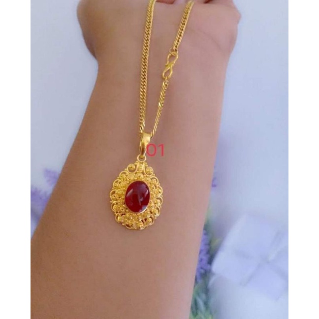 Kalung titanium liontin kuningan