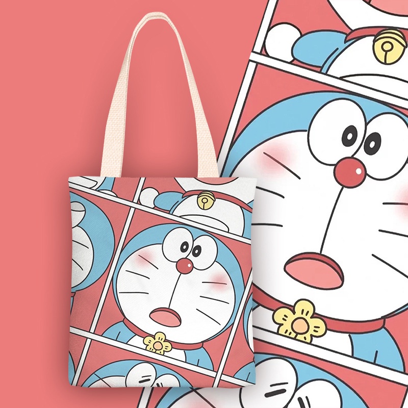 ♟✌☽Sera Doraemon Tas Kanvas Wanita Tas Bahu Tunggal Portabel Kapasitas Besar Anak Siswa Kelas Tas Gadis 2022 Musim Gugur dan Musim Dingin