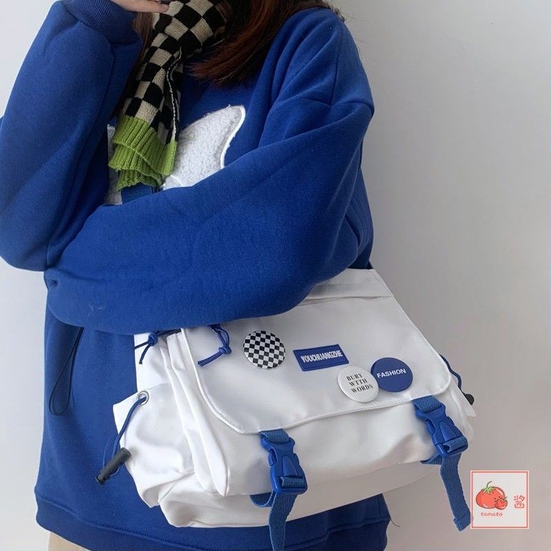 ﹉Sera Messenger bag Klein blue messenger bag yang dapat menampung tas bahu ipad all-match untuk siswa di kelas