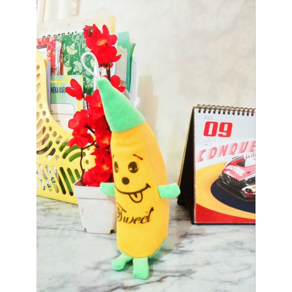 Boneka capit banana, boneka capit pisang