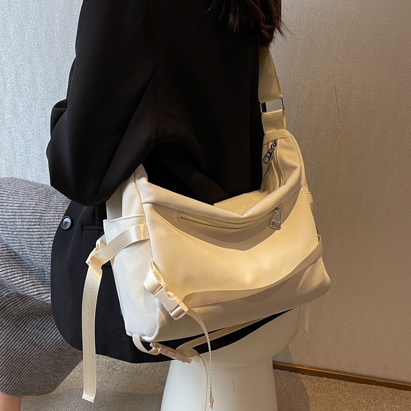 ✱☢▪Sera Jepang Kapasitas Besar Tas Wanita Kasual Keren Olahraga Commuter Kanvas Tas Siswa Kelas One-Shoulder Messenger tas