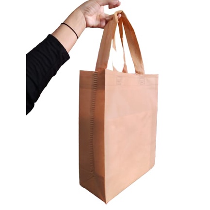 

Tas Spunbond Handle Box uk 25x30x10 / Goodie Bag / Tas Kain Polos