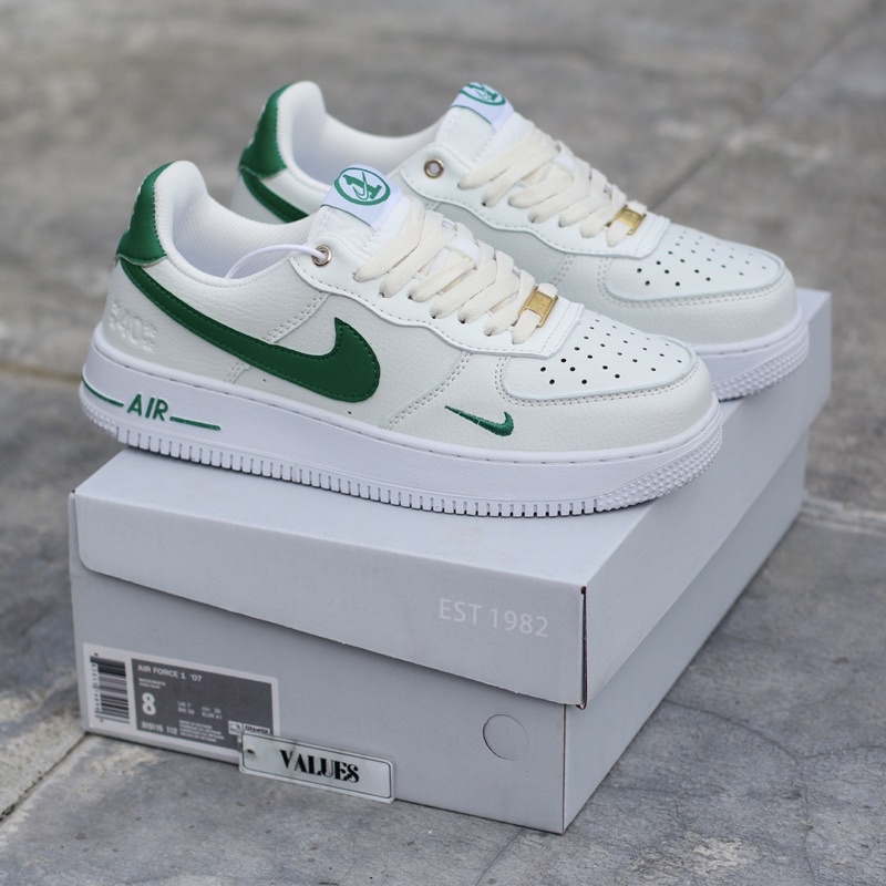 white air forces with green tick