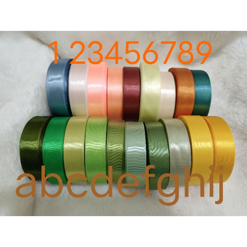 Pita satin 2 cm polos dan Lis emas per rol  20 yard