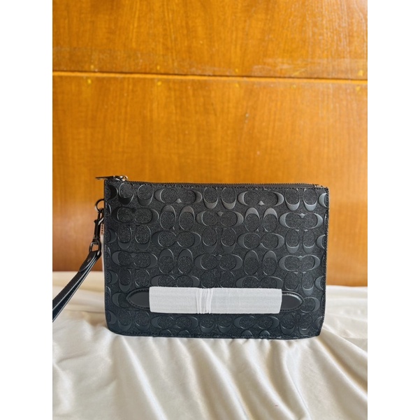 coach clutch signature embossed for men