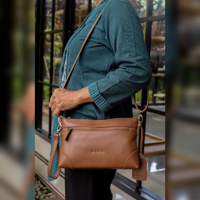 Aira Tas Selempang Wanita Sling Bag Maura Kulit Sapi Asli Bahan Pull Up Leather Terbaru Kain Lurik Tradisional Tali Panjang Adjustable Tali Pendek Kekinian Original