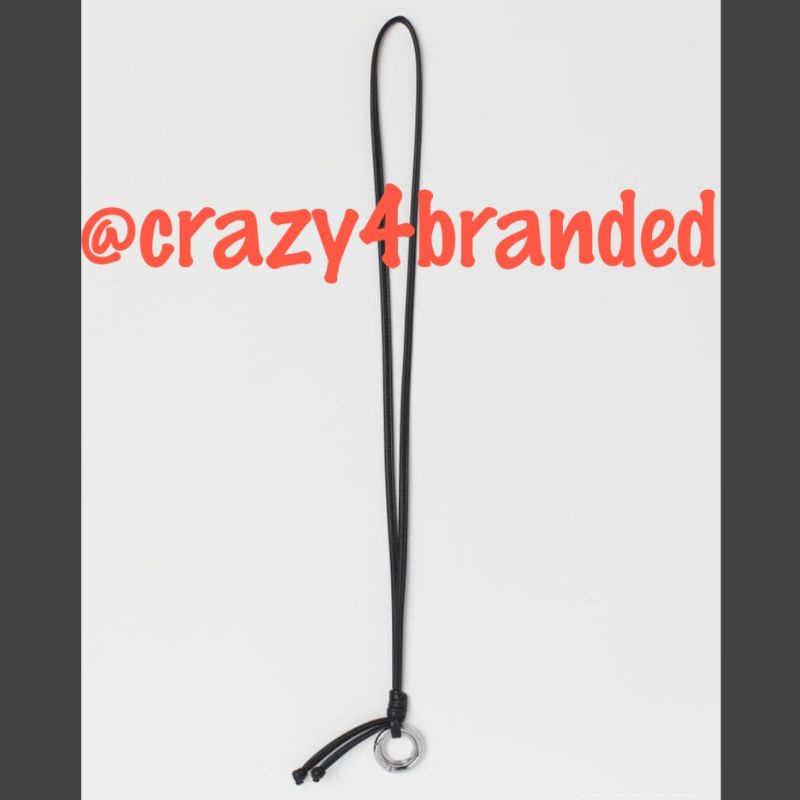

H&M Lanyard in faux leather with two metal key rings
