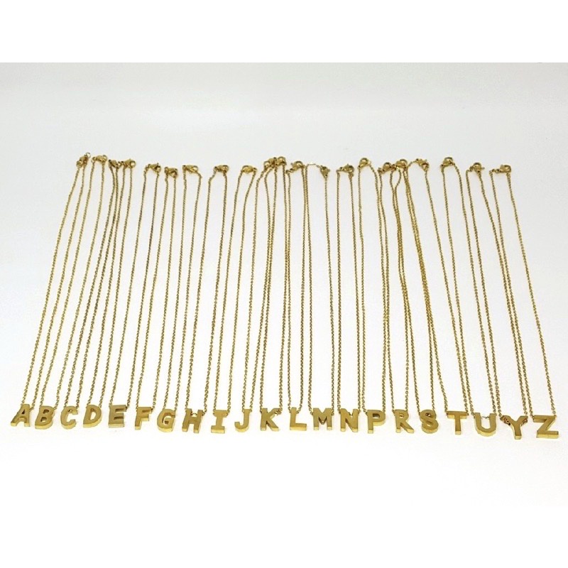Kalung huruf titanium anti karat