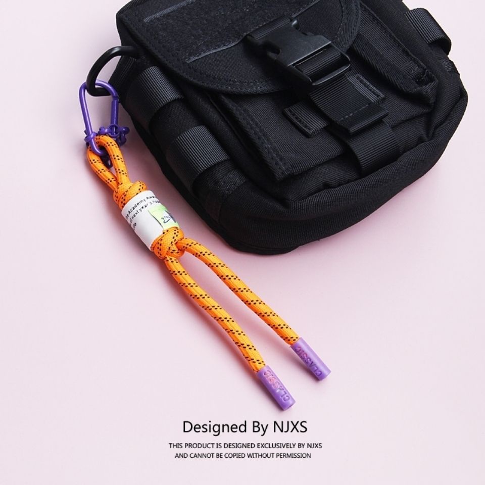 SearNJXSHip Hop Fluorescent Liontin Ornamen Tas Sekolahnya Liontin Wanita Tenunan Tangan Celana Akse