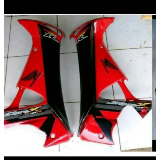 Sayap kiri kanan supra x 125 lama warna merah