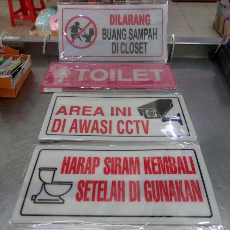 

Tulisan Sign mika akrilik Dilaeang buang sampah ditoilet - Toilet - Area ini diawasi cctv - Harap siram kembali