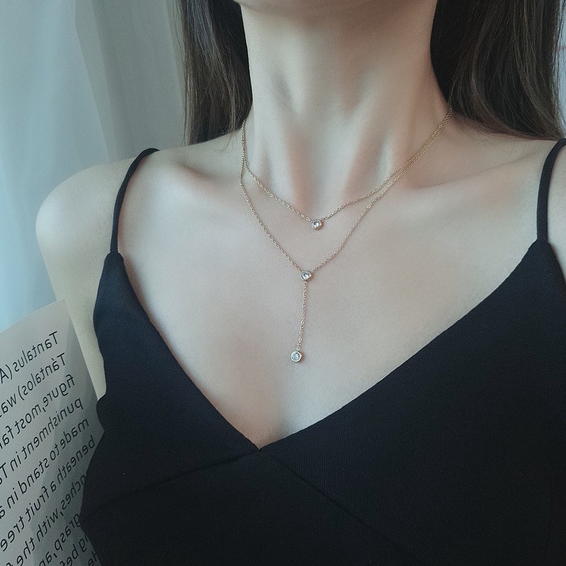 Kalung Rantai Klavikula Bahan Titanium Steel Plated 18K Rose Gold Aksen Berlian Rumbai Gaya Korea Untuk Wanita