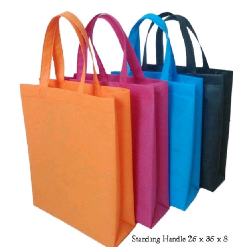 

Goodie Bag Handle uk 25x35x8 Kain 70gsm Tas Spunbond Tas Hampers Tas Kado