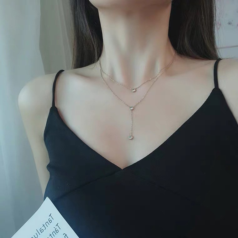 Kalung Rantai Klavikula Bahan Titanium Steel Plated 18K Rose Gold Aksen Berlian Rumbai Gaya Korea Untuk Wanita