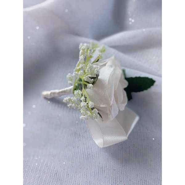 Korsase jas/ boutonniere