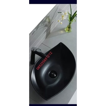 wastafel batu marmer oval hitam model daun