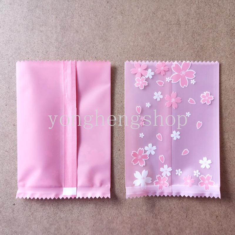 100pcs / set Kantong Kemasan Kue / Permen / Biskuit Motif Bunga Sakura Pink Ukuran 7x10cm Untuk Pesta