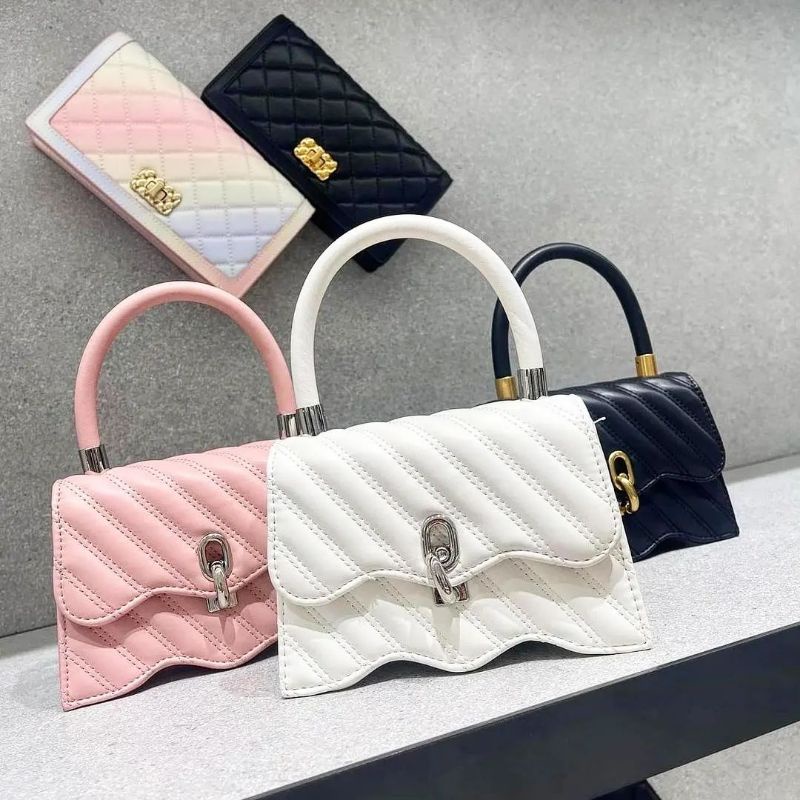 CK Freja Wavy Quilted Top Handle Bag