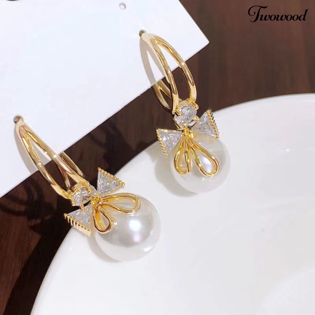 Twowood 1pasang Wanita Drop Earrings Bow-knot Shiny Rhinestone Mewah Simetris Stainless Ear Dekorasi Tepi Halus Mutiara Imitasi Lady Huggie Earrings Perhiasan