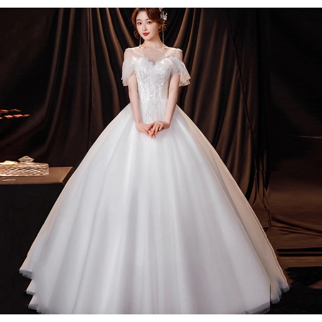 Gaun Pengantin Ilusi Kerah O Pendek Backless Tulle Renda Berpayet Mutiara Mewah Putih dari Bahu Gaun