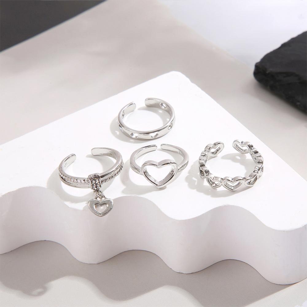 Timekey 4pcs/Set Cincin Cinta Berongga Sederhana Kreatif Cincin Set Cincin Paduan Yang Dapat Disesuaikan Aksesoris Perhiasan Temperamen Untuk Wanita H1X3