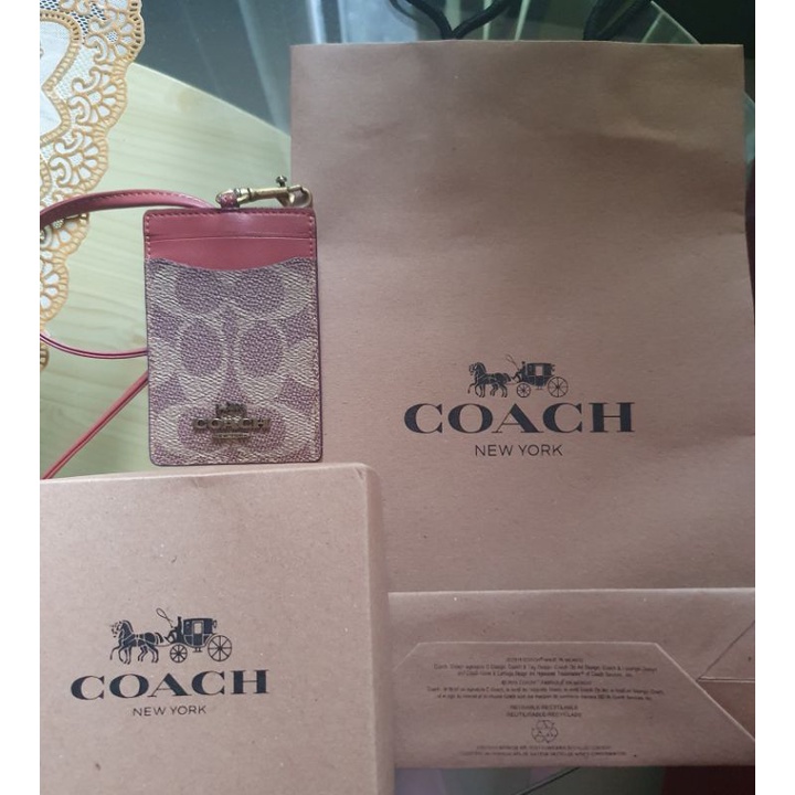 

lanyard coach coklat