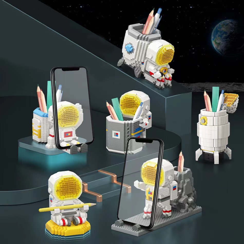 Blok Bangunan Spaceman Pen Holder Handphone Holder Kreatif Pencahayaan Mainan Partikel Ornamen Kreatif Kompatibel Lego