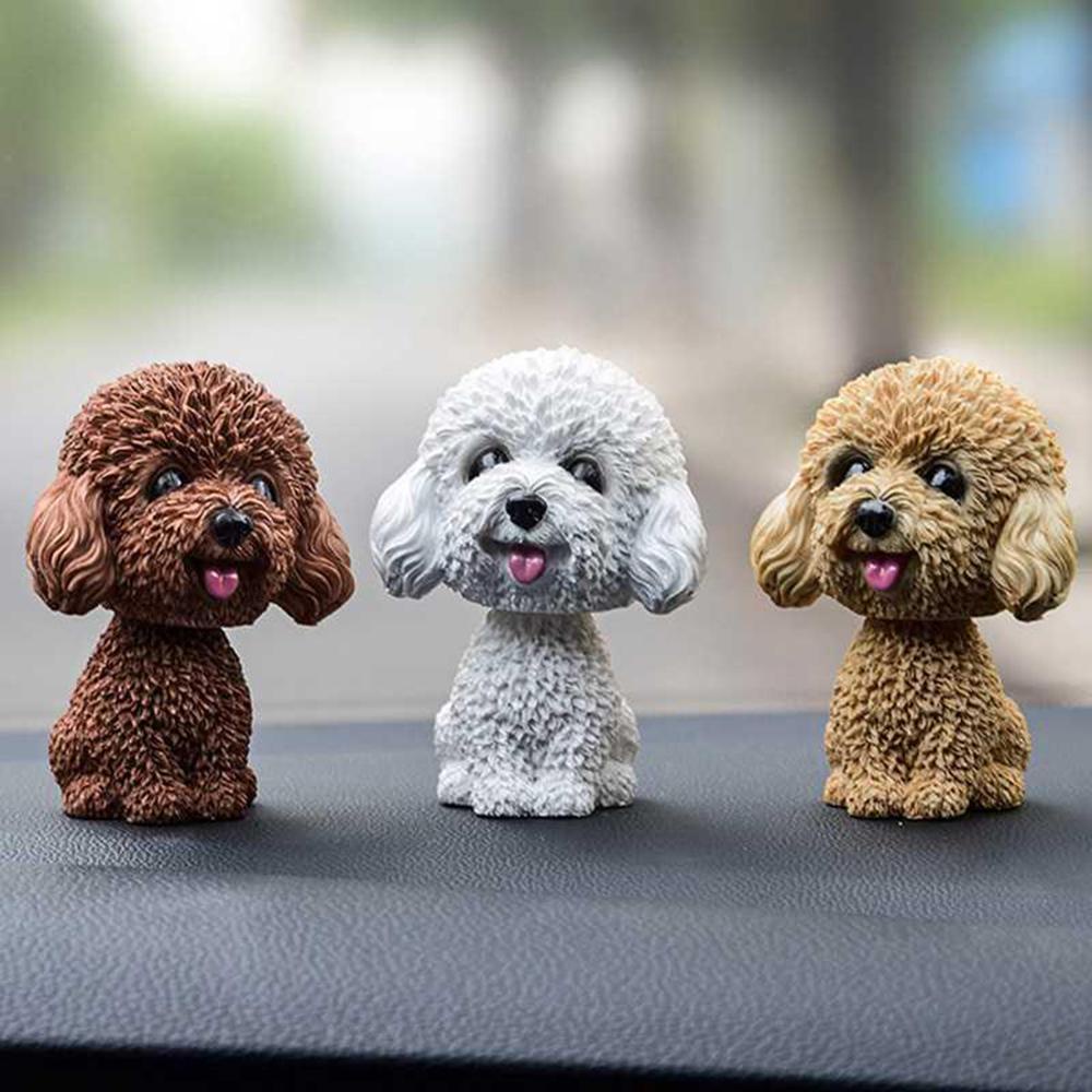 Hiasan Kepala Goyang Konsol Tengah Mobil Dekorasi Gaya Baru Goyang head dog decoration Interior dog decoration resin