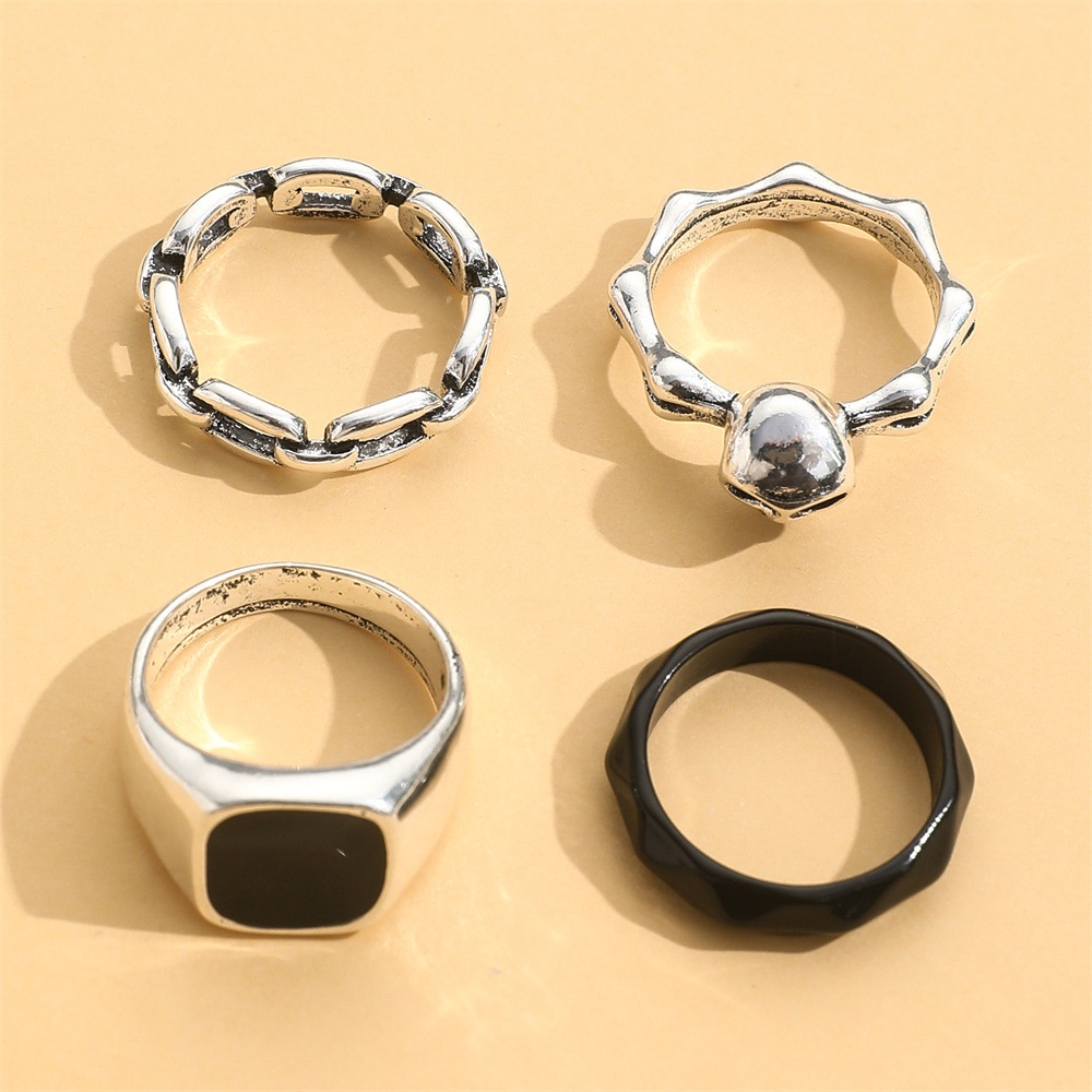 Tren Fashion Hitam Tua Gaya Set Cincin Hitam Drip Rantai Cincin Tengkorak Kepala Perlindungan Lingkungan Alloy Ring 4buah