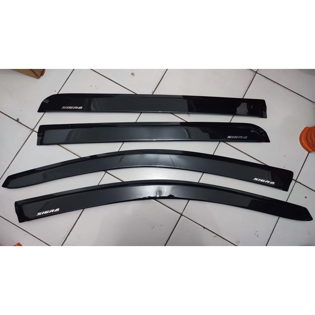 talang air mobil sigra hitam