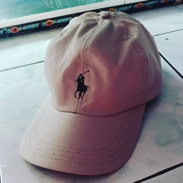 Topi polo bordir cream