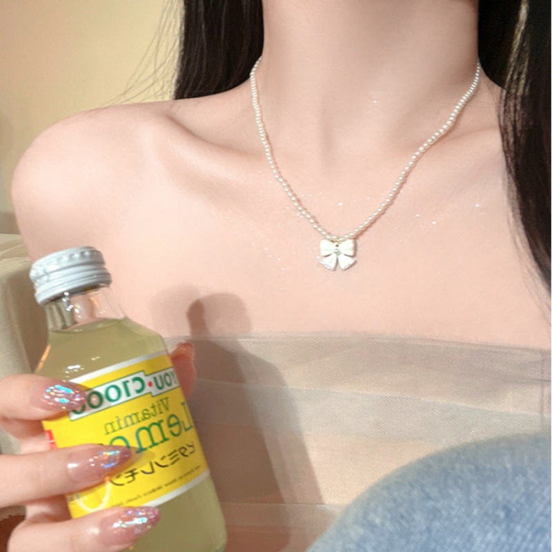 Roselife Korea Lucu Busur Putih Mutiara Manik-Manik Choker Kalung Untuk Wanita Gadis Elegan Ikatan Simpul Pesona Pendek Rantai Kalung Perhiasan Hadiah