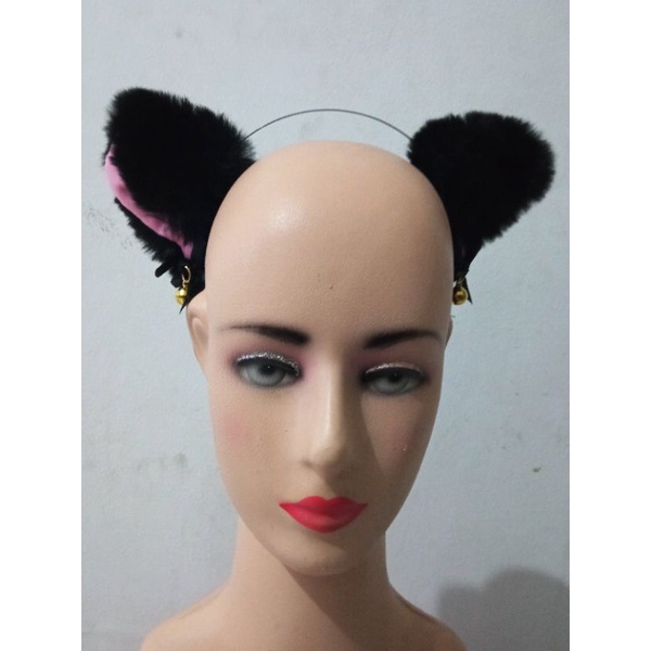 bando kuping kucing lonceng bulu