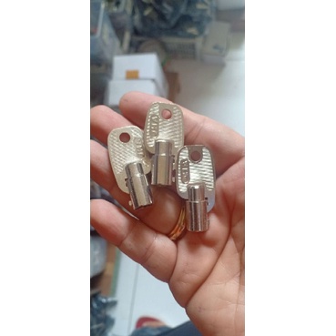 Bahan kunci anak Dingdong kuningan