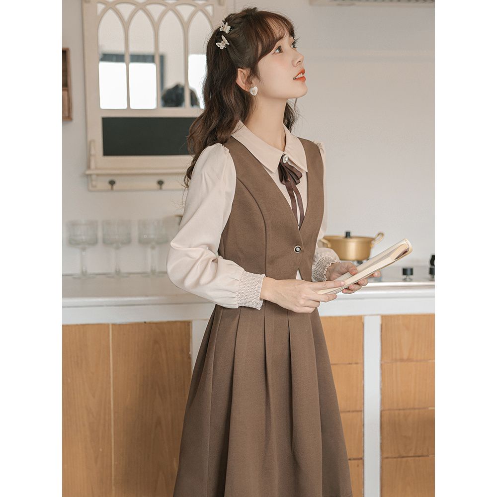 Angin lembut dan temperamen manis penyambungan gaun lipit dua potong palsu pinggang wanita rok A-line siswa ramping