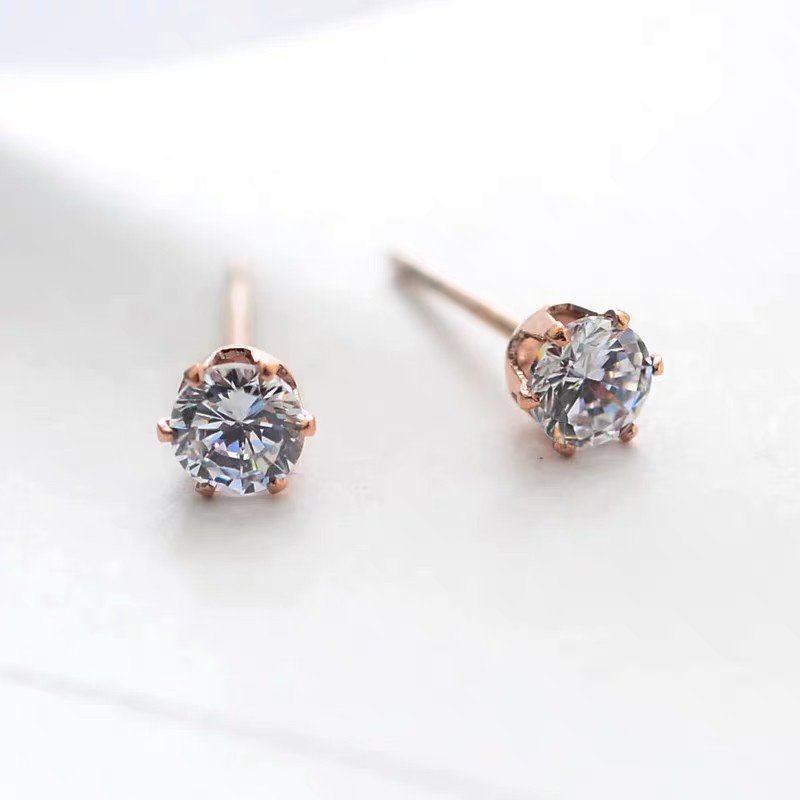 Anting Tusuk Gantung Bahan Titanium Steel Plating Rose Gold 18K Hias Zircon Gaya Simple / Unik Hypoallergenic Untuk Wanita