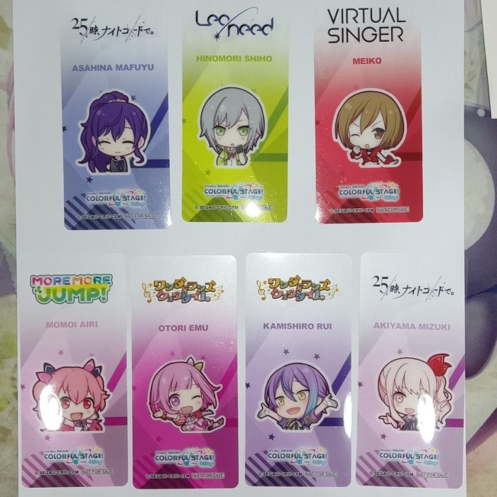 

Terlaris ✨ -Terlaris -Bookmark/Pembatas Buku Karakter Project Sekai Official - Emu- 2.1.23- 2.2.23