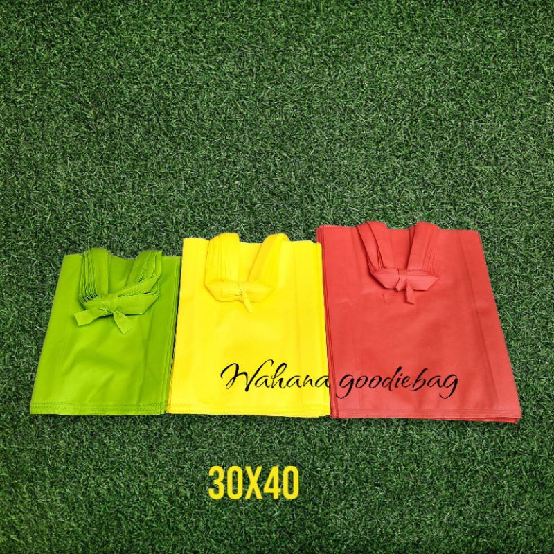 

sUHE Goodiebag 30x40 sUPeR HEmat Lipat samping isi 12tas