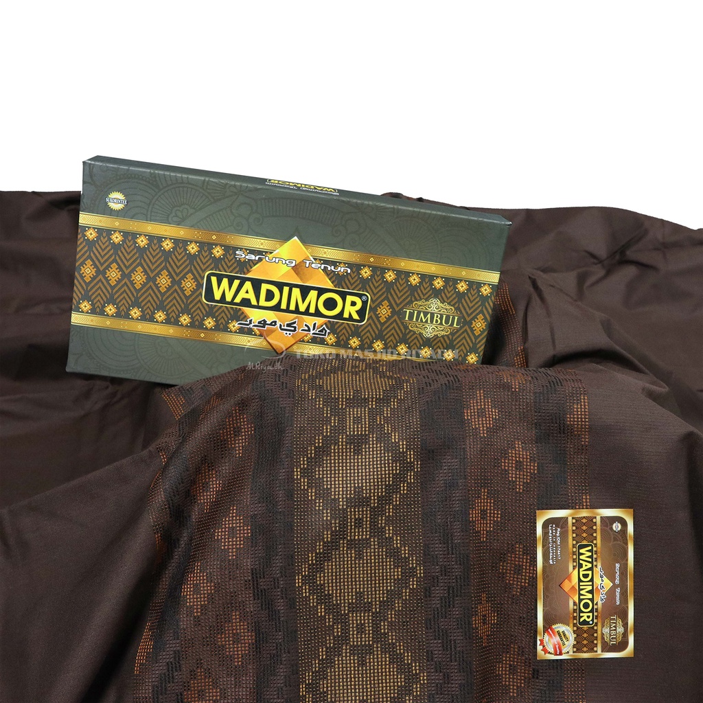 Sarung Wadimor Motif Timbul Polos Tumpal Warna