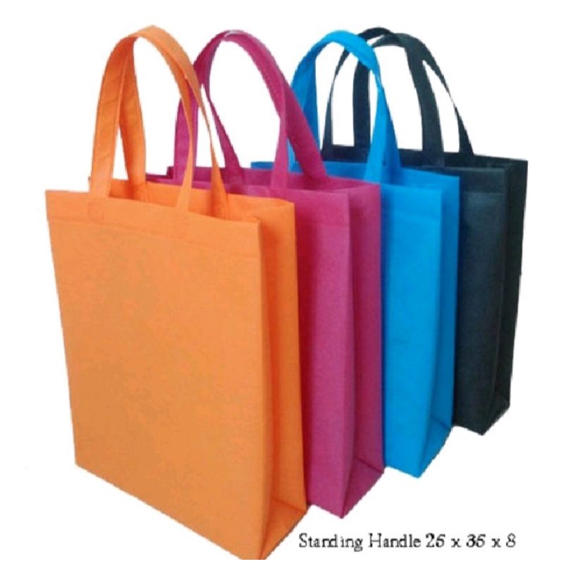 

1 Lusin (12pcs) Goodie Bag Handle uk 25x35x8 Kain 70gsm Tas Spunbond Tas Hampers Tas Kado