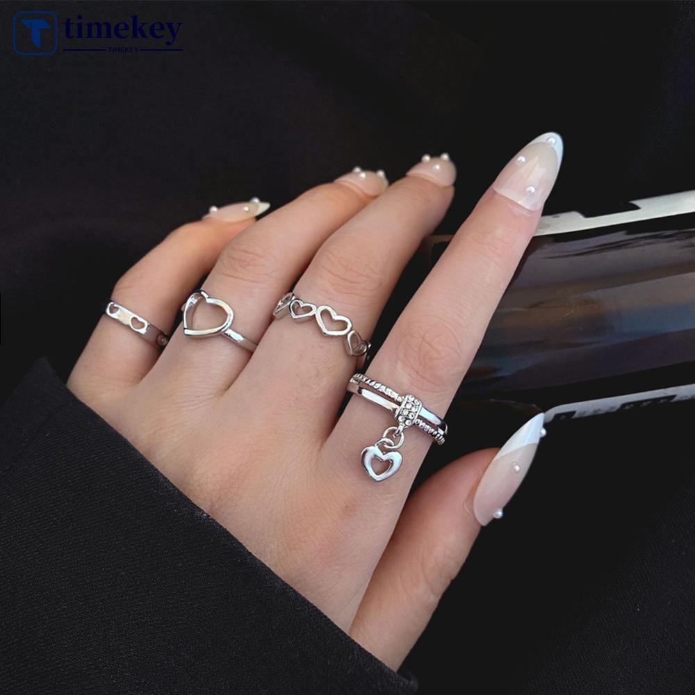 Timekey 4pcs/Set Cincin Cinta Berongga Sederhana Kreatif Cincin Set Cincin Paduan Yang Dapat Disesuaikan Aksesoris Perhiasan Temperamen Untuk Wanita H1X3