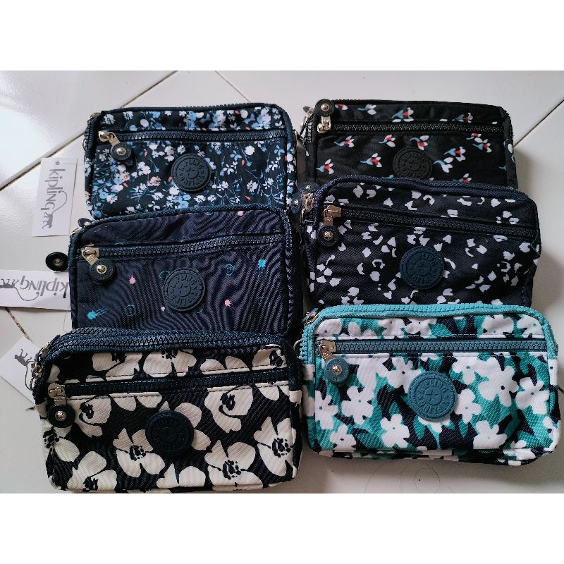TAS DOMPET IMPORT MERK KIPLING