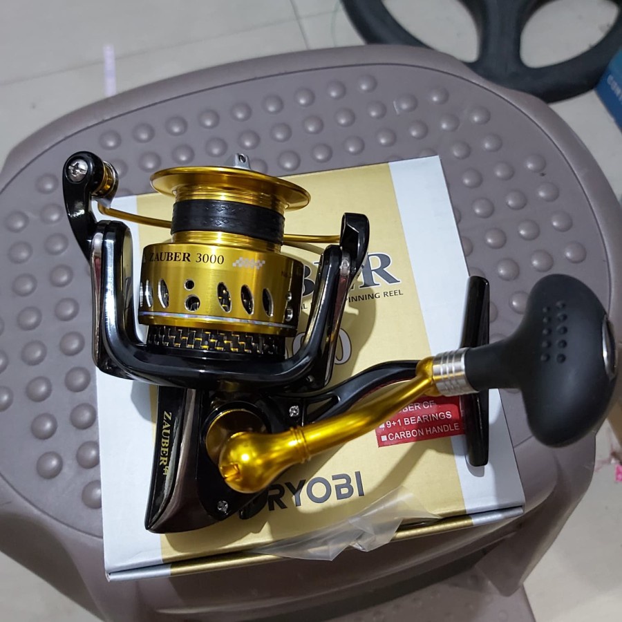 reel ryobi zauber cf 3000 body carbon Terbaik